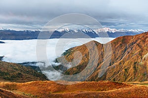 Snow-covered mountains in the mist. Autumn at Koruldi Lake. Euro