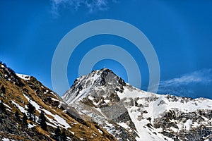 Snow covered mountains and rock