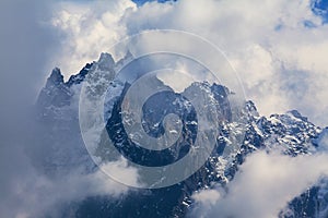 Snow covered mountains and rocky peaks in the French Alps