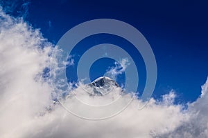 Snow covered mountains and rocky peaks in the French Alps photo