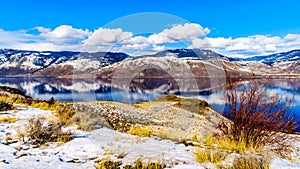 Snow Covered Mountains surrounding Kamloops Lake in central British Columbia, Canada