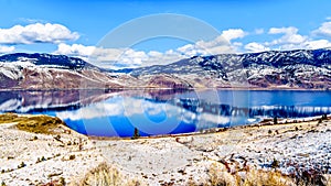 Snow Covered Mountains surrounding Kamloops Lake in central British Columbia, Canada