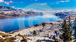 Snow Covered Mountains surrounding Kamloops Lake in central British Columbia, Canada