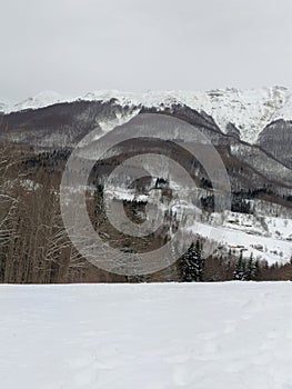 snow covered mountains in winter, Abetone, Pistoia, Italy, photo