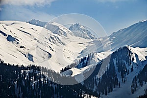 Snow covered mountains in winter, Gulmarg, Jammu And Kashmir, India photo