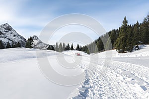 Snow-covered mountains winter landscape. Snowy  alpine road