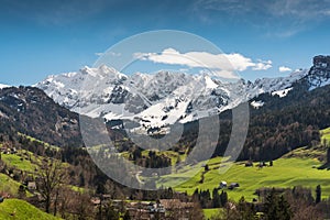 The snow-covered Mt. Saentis in the Alpstein Mountains in Switzerland photo