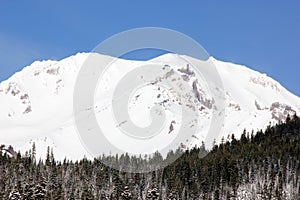 Snow covered Mt. Shasta Peak with human face