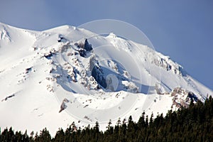 Snow covered Mt. Shasta Peak with human face