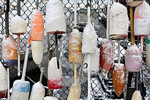 Snow covered nautical buoys