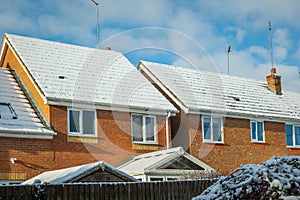 Snow covered new built house roof in england uk