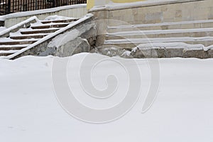 Snow Covered Old Building and Stairs