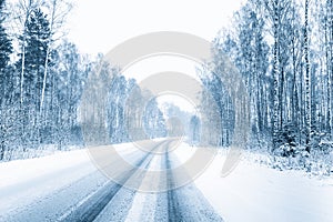 Snow-covered Open Road During A Snowstorm In Winter. Adverse Weather Conditions.