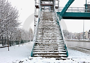 Snow-covered overpass stairs, winter, snown photo