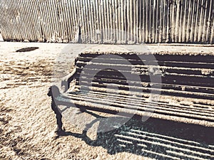 Snow Covered Park Bench. Snow covered bench in park. Snow covered bench. Winter scene. winter Park.