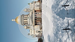 Snow-covered Park in front of St. Isaac's Cathedral in St. Petersburg - Russia in the spring sun