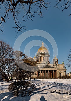 Snow-covered Park in front of St. Isaac's Cathedral in St. Petersburg - Russia in the spring sun