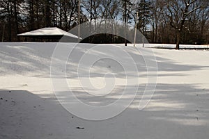 snow covered park, untouched, at Dean Park Shrewsbury, Ma