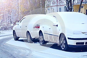 Snow covered parked cars