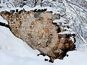 Snow-Covered Partial Old Rock Wall in Murray Park