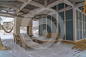 Snow covered patio of a clubhouse in Daybreak Utah