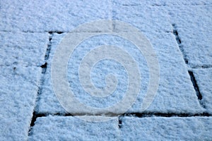 Snow Covered Patio Slabs on a Winter Morning