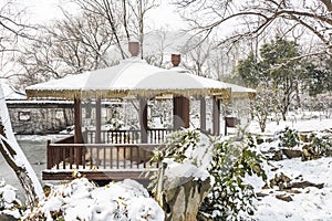 Snow covered pavilion