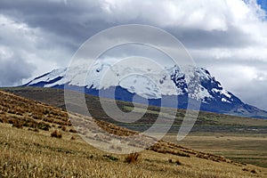 Snow covered peak of Antisana Volcano in Antisana Ecological Reserve