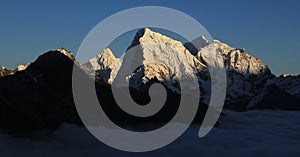 Snow covered peaks of Mt Ama Dablam, Cholatse, Taboche and Tobuche photo