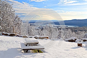 Snow Covered Picnic Table with a View