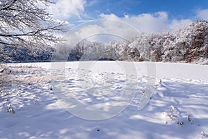 Snow Covered Pond and Woodlands at Salem Hills