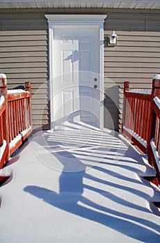 Snow covered porch.