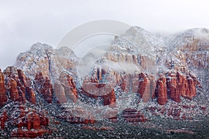 Snow covered red rocks in Sedona, Arizona.