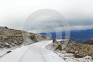 Snow-covered road on a mountain pass