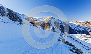 Snow-covered road in the mountains