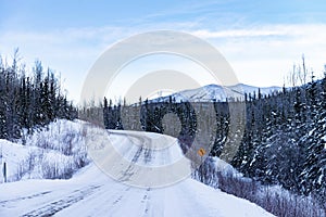 Snow covered road in the wilderness
