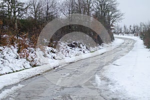 Snow-covered road, winter transportation concept