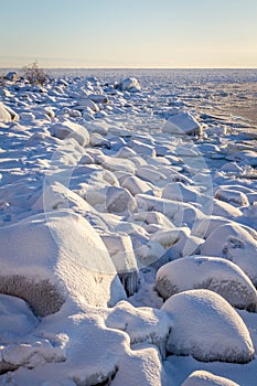 Snow covered rocks at the shores of the Baltic sea, northern Scandinavia