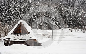 Snow covered roofed house Gassho-zukuri in Ainokura village, Gif