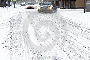 Snow-covered slippery road after snow blizzard