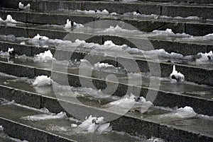 Snow-covered steps in the public park.