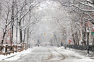 Snow covered street along Washington Square Park in New York City photo