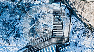 Snow covered urban stairs with snow