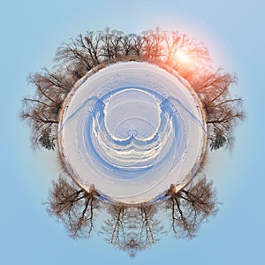 Snow-covered winter landscape in the shape of a planet