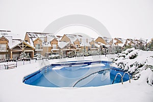 Snow covered yard in a beautiful neigborhood in Bucharest.Christmas landscape