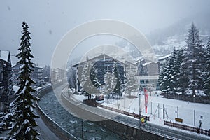 Winter Wonderland in Zermatt, Switzerland Red Train Through Snowy Alpine Town