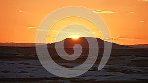 Snow in the desert at sunset