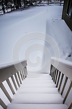 Snow drift at the bottom of stairs