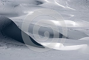 Snow dunes after a snowfall photo