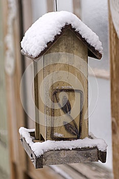 Snow on an Empty Bird Feeder